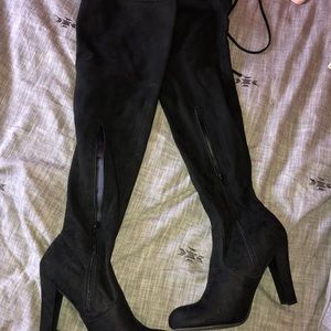 Thigh high heeled boots